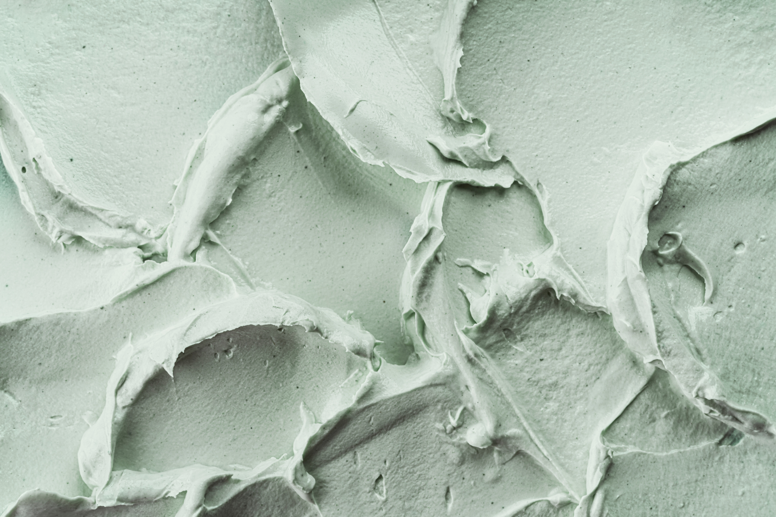 Green Cosmetic Clay Mask Texture Close up.